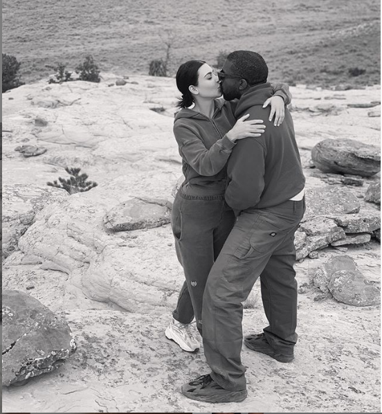 Kim Kardashian shares a sweet kiss with her husband Kanye West in new loved-up photo