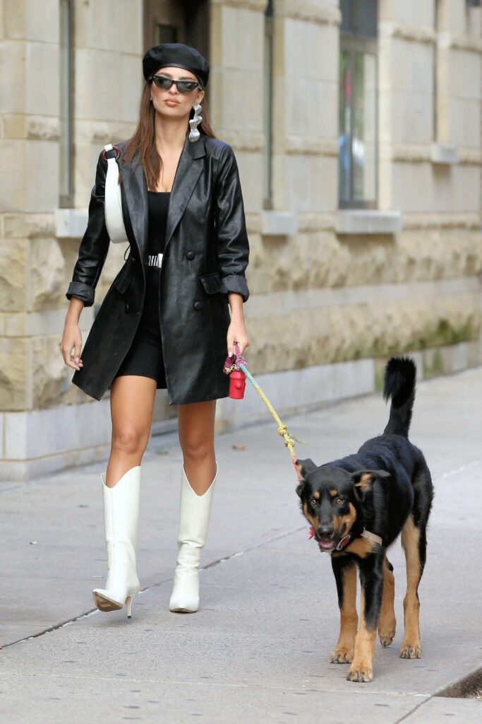 emily ratajkowski in white boots and black leather coat walking her dog colombo in new york