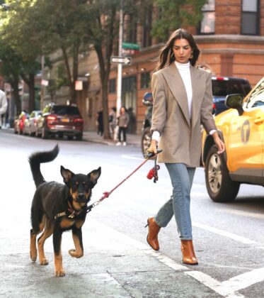 Emily Ratajkowski in White Boots and Black Leather Coat – Walking her dog Colombo in New York