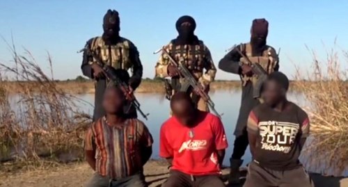 Breaking: ISWAP Terrorists Execute Two Nigerian Soldiers, Policeman In New Video; Watch The Sad Video If You Have A Strong Heart!