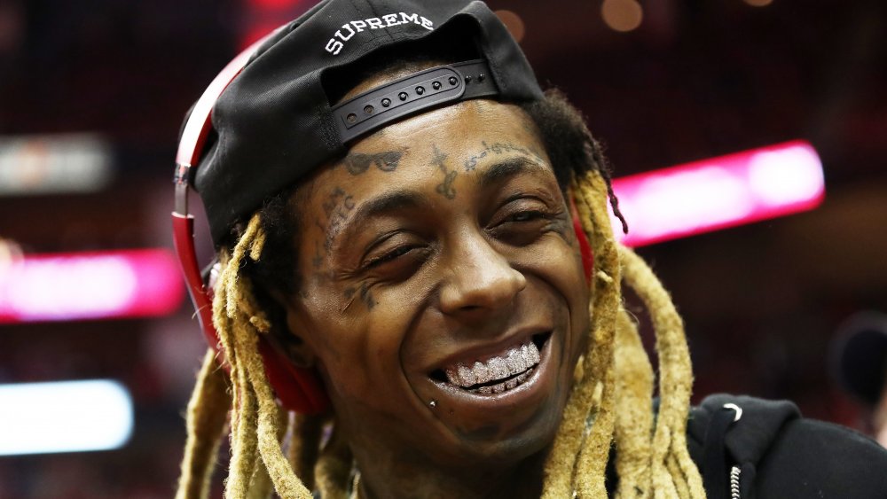 heres how much lil waynes teeth are worth