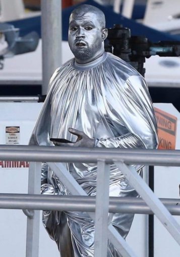 rapper kanye west paints entire body silver to perform the birth of jesus christ play photos 3
