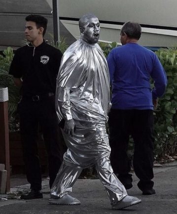rapper kanye west paints entire body silver to perform the birth of jesus christ play photos 4