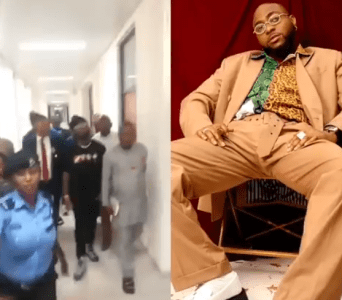 Security Officials Captured Struggling For Money Davido Gave Them As He Visits National Assembly (Watch Video)