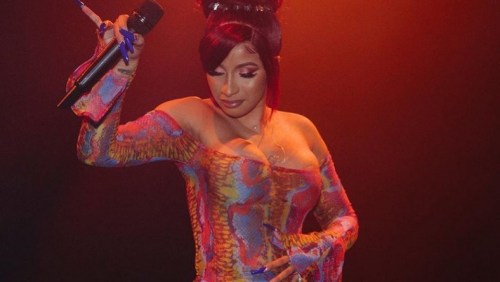 watch the moment angry fans threw bottles on stage at cardi bs concert in ghana