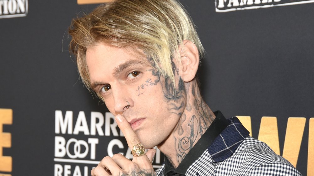 The meaning behind Aaron Carter's latest face tattoo