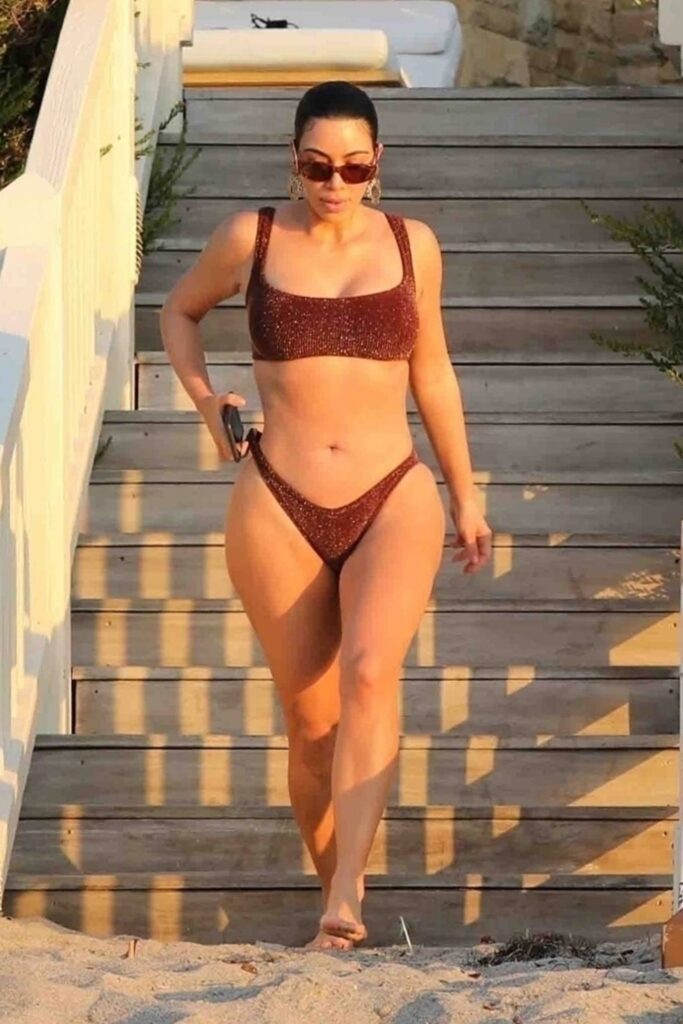 kim kardashian wearing bikini on the beach in malibu