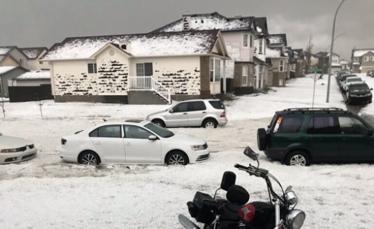Tornadoes touch down in southern Alberta, as floods and tennis ball-sized hail hit Calgary