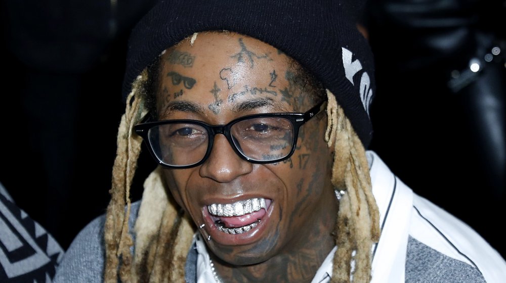 The Unsaid truth behind Lil Wayne's TNT face tattoo