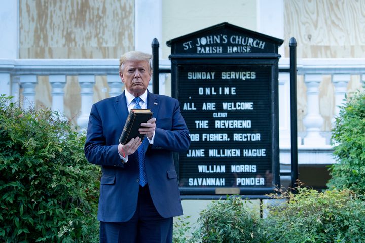 Trump holds a Bible while visiting St. John's Church near the White House after the area was cleared of people protesting the