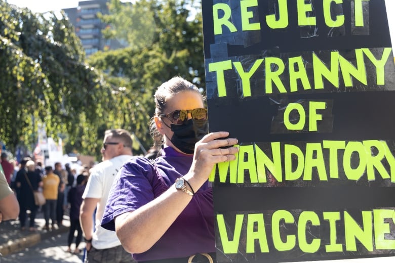 B.C. officials decry targeting of health-care workers as thousands protest vaccine passports