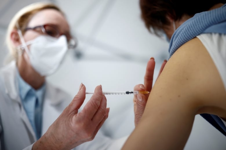 with patience and respect montreal doctor convinced vaccine hesitant co worker to get her shots
