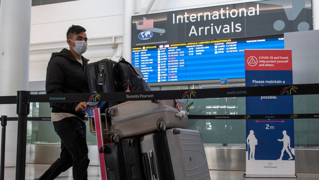 ottawa to toughen international travel restrictions as omicron concerns escalate