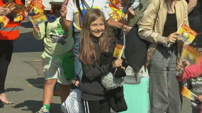 Tears, laughter and lots of hugs as 170 Ukrainians arrive in New Brunswick
