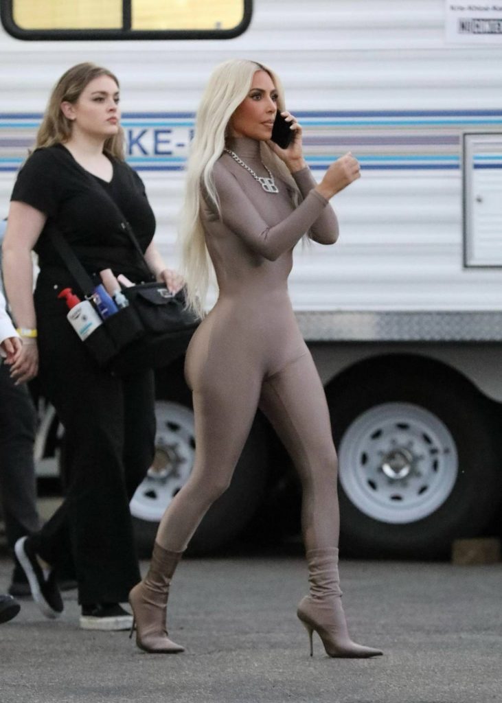 kim kardashian in a skin tight steel colored ensemble shoots a commercial for hulu in la 11