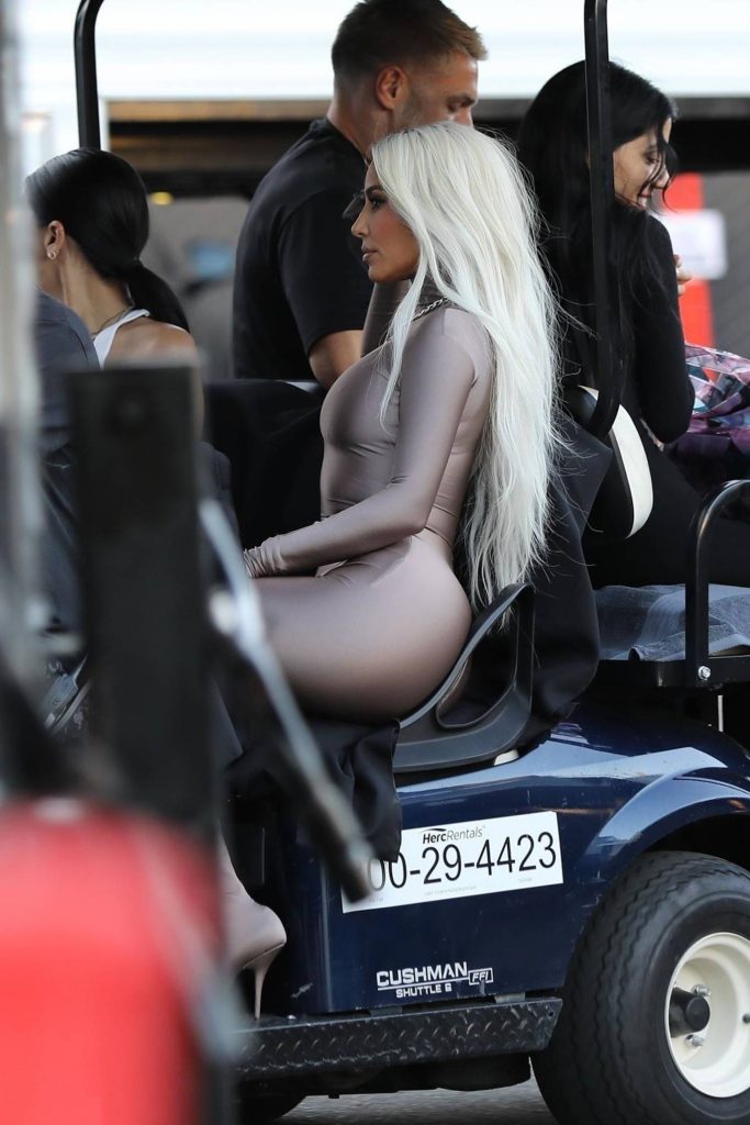 kim kardashian in a skin tight steel colored ensemble shoots a commercial for hulu in la 13