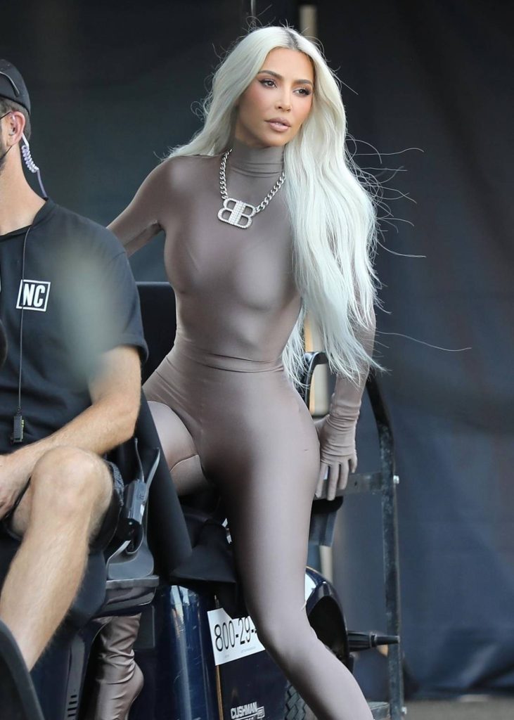 kim kardashian in a skin tight steel colored ensemble shoots a commercial for hulu in la 16