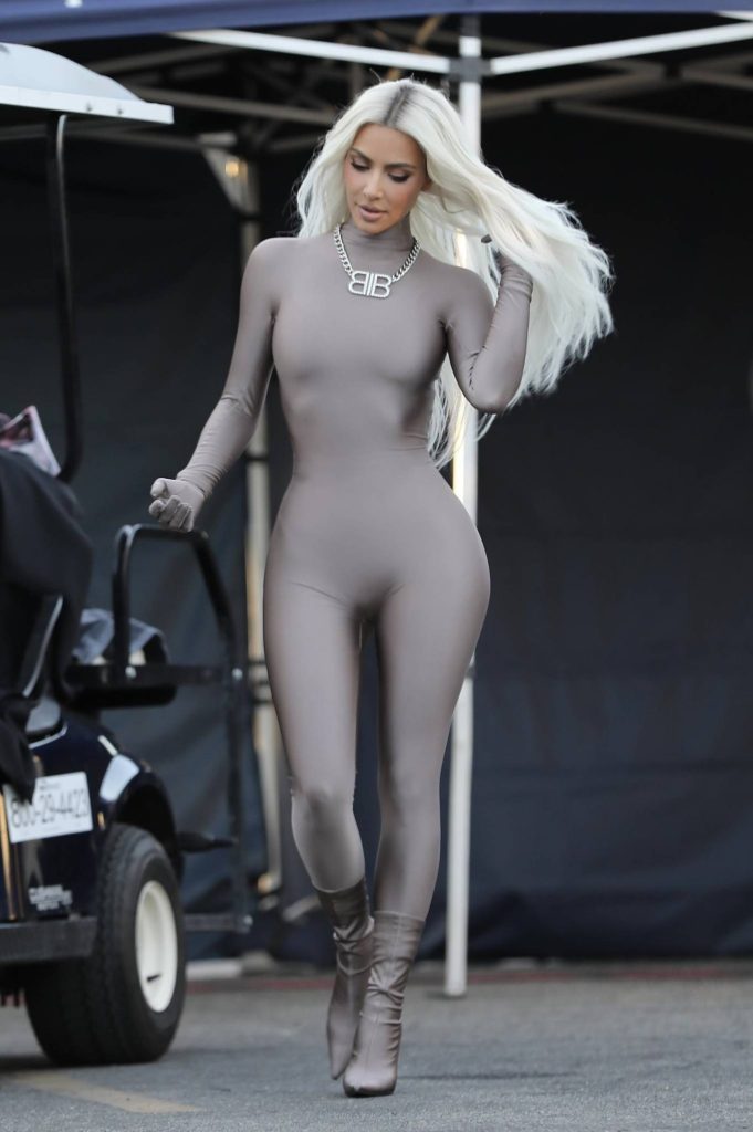kim kardashian in a skin tight steel colored ensemble shoots a commercial for hulu in la 21