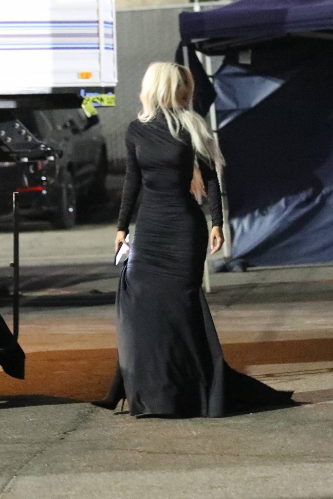 kim kardashian in a skin tight steel colored ensemble shoots a commercial for hulu in la 8