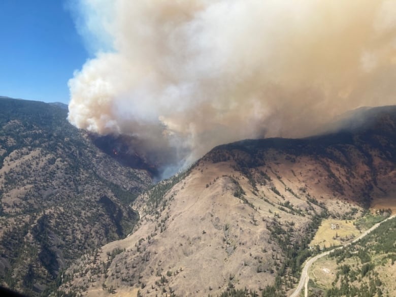 b c s biggest wildfires remain stable but extreme heat and terrain spark worries for coming days