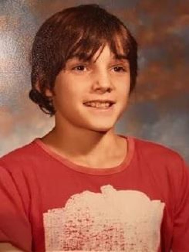 1980s school picture of young boy smiling