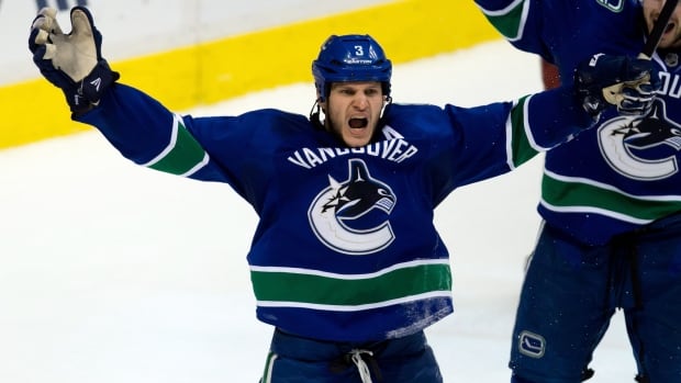 longtime vancouver defenceman bieksa to sign 1 day deal to retire as canuck