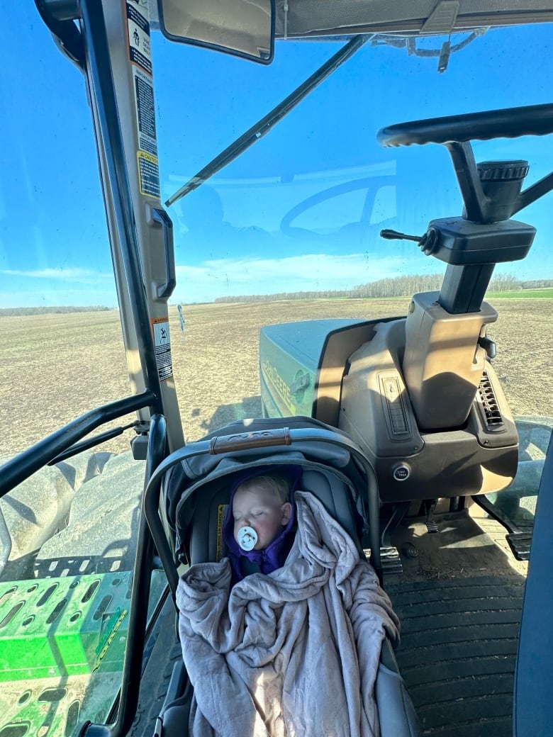 this babys mom is a 3rd generation ontario farmer and isnt letting parenthood slow her down