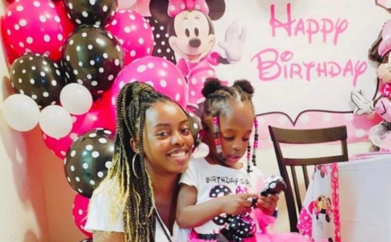 Najjuma is pictured here with her daughter on her third birthday in March 2022. It's the last time she says she remembers being happy. Not long after, she was sent a deportation order and could now be separated from her little girl. 