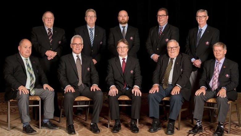Photo of hockey canada's board of directors in 2018 made up entirely of men 