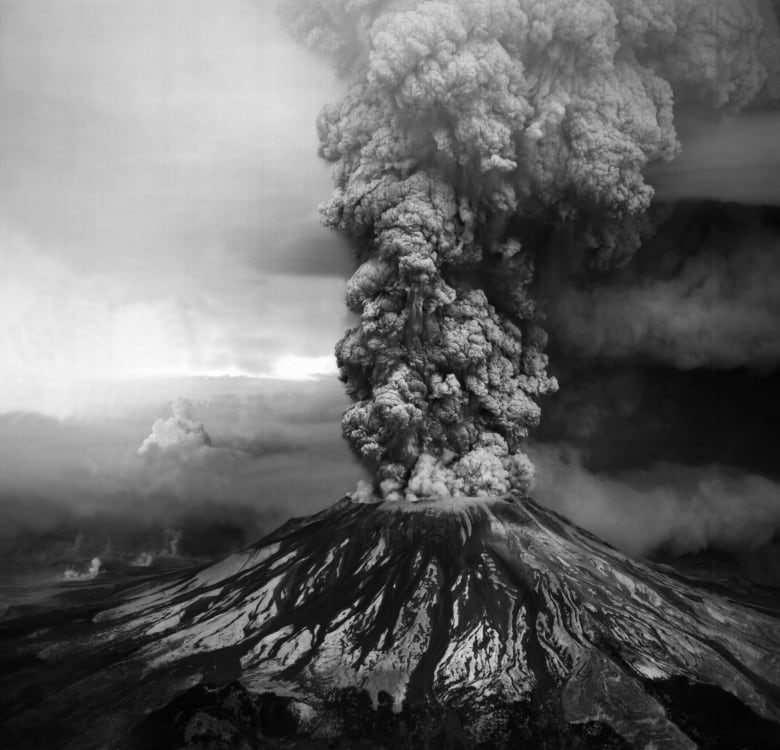 A black and white image of Mount Saint Helen's in Washington state erupting.