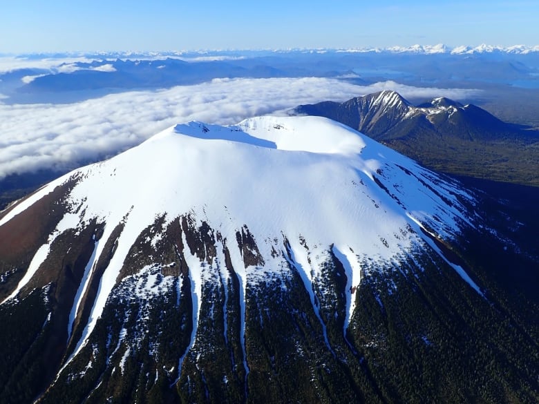 A snow-capped volcano.