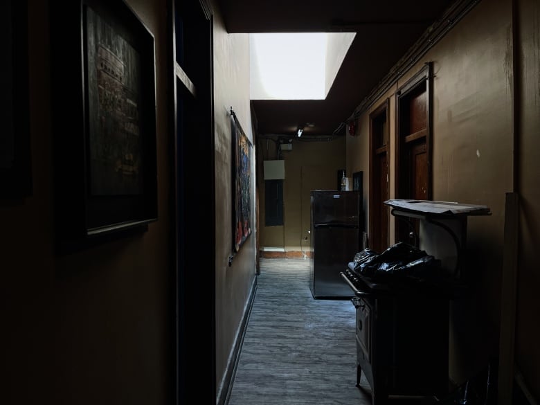 A dark corridor in an apartment building.