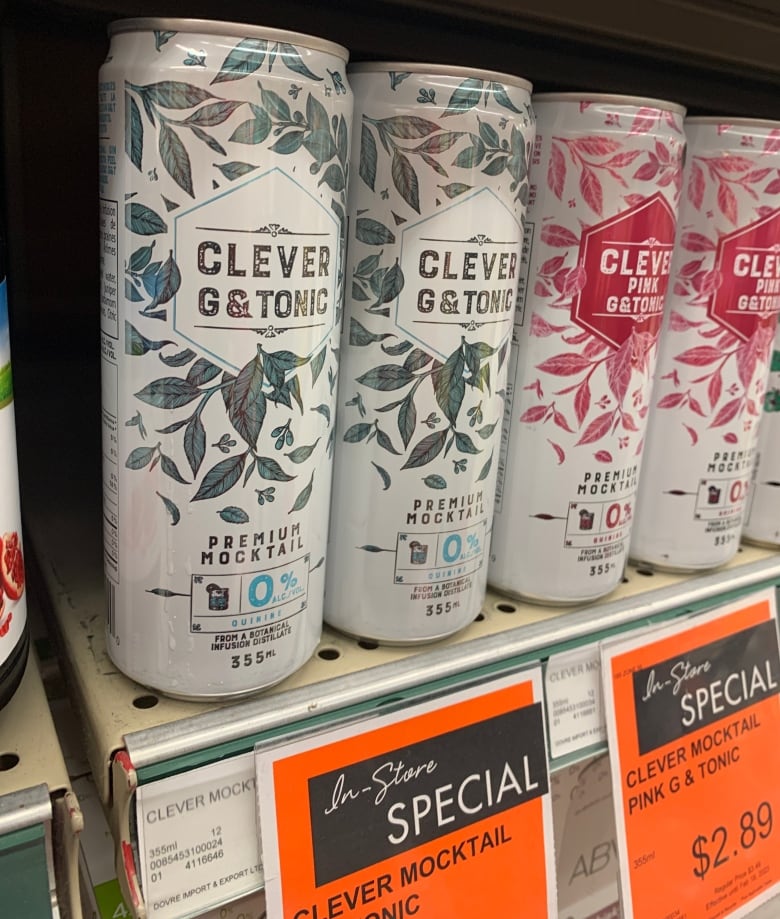 A row of mocktails in cans at the grocery store.