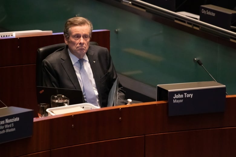 John Tory watches during a budget meeting at Toronto City Hall on Feb. 15.