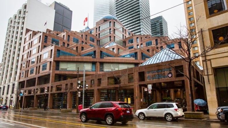 The Metropolitan Toronto Police Headquarters on College Street on a rainy day - January 4, 2023.