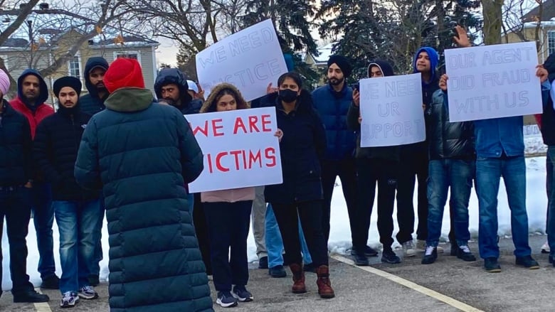 Dozens of students showed up at the park in the community northwest of Toronto to fight to stay in Canada.