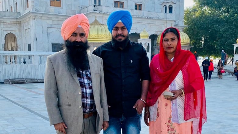 Karanveer Singh (middle) is one of the dozens of international students from India who could soon be sent back there, accused of using forged documents to get into Canada.