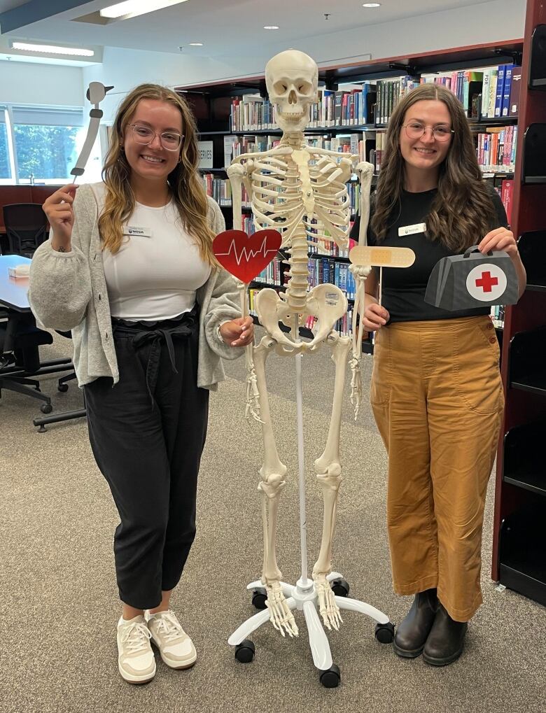 Northern Ontario School of Medicine students Brooklyn Ranta, left, and Savanah Tillberg pose on their first day of school in Thunder Bay 