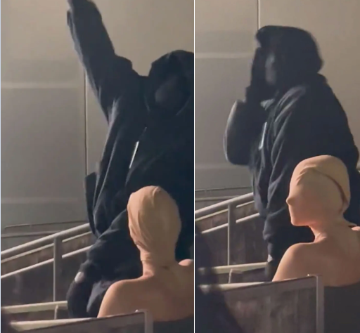 Kanye West and wife completely cover their faces at fashion show (video)