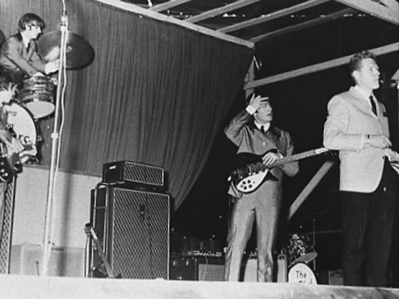 Red Robinson on stage with the Beatles in Vancouver.
