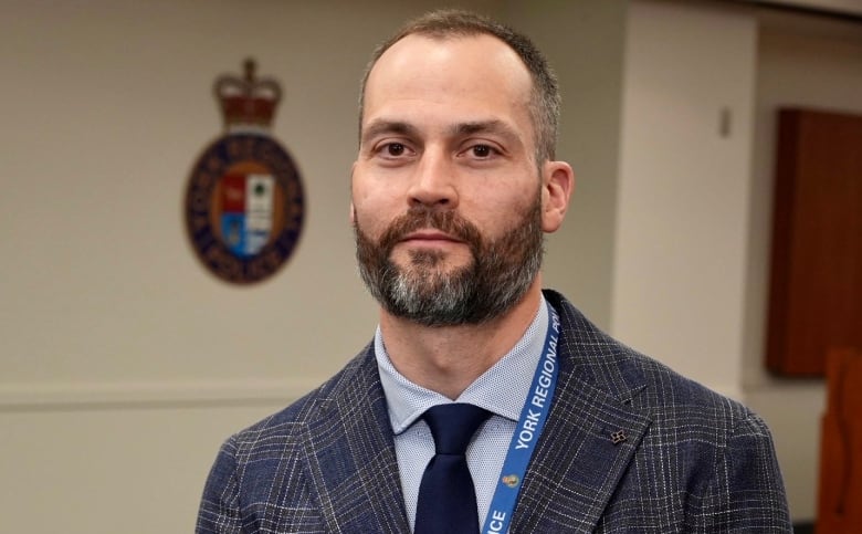 A photograph of Detective Sgt. Courtney Coulson with York Regional Police's Homicide Unit. He is investigating the disappearance of Isabella Dan.