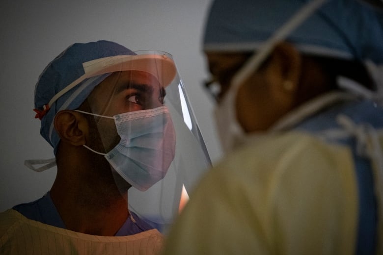 Surgical oncologists Dr. Usmaan Hameed operates on a patient in North York General Hospital on May 26, 2020.