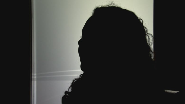 Jessica pictured as a dark silhouette 
