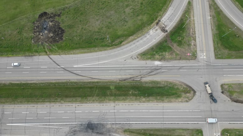 An aerial view looking down at a highway intersection