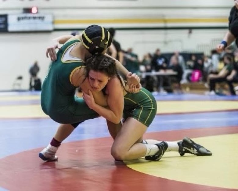 Former wrestler ‘shocked’ by disciplinary decision after filing sexual assault complaint against coach