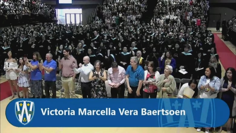 Victoria Baertsoen receives a standing ovation at a Friday convocation ceremony at the University of Windsor. The 24-year-old was killed in a May long weekend crash in her hometown of Wallaceburg, Ont.