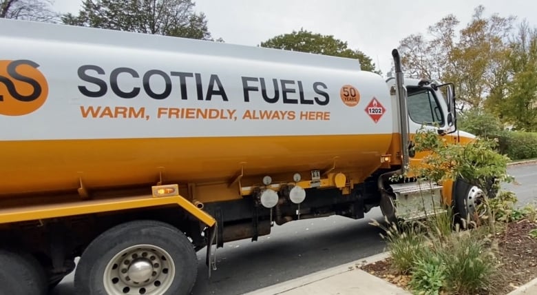 A Scotia Fuels truck parked in a residential neighbourhood.