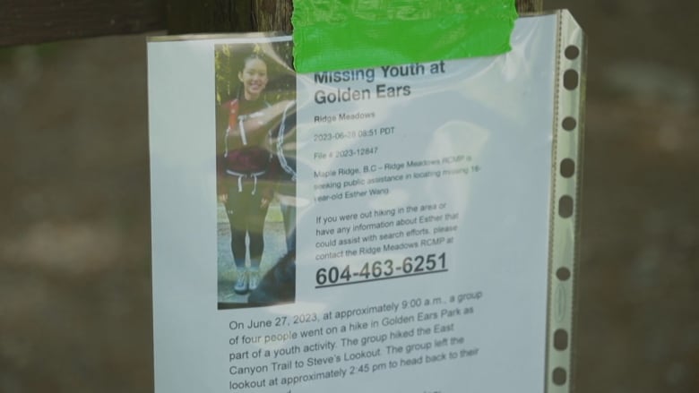 Missing persons signs dot the trail where 16-year-old Esther Wang went missing on Tuesday.