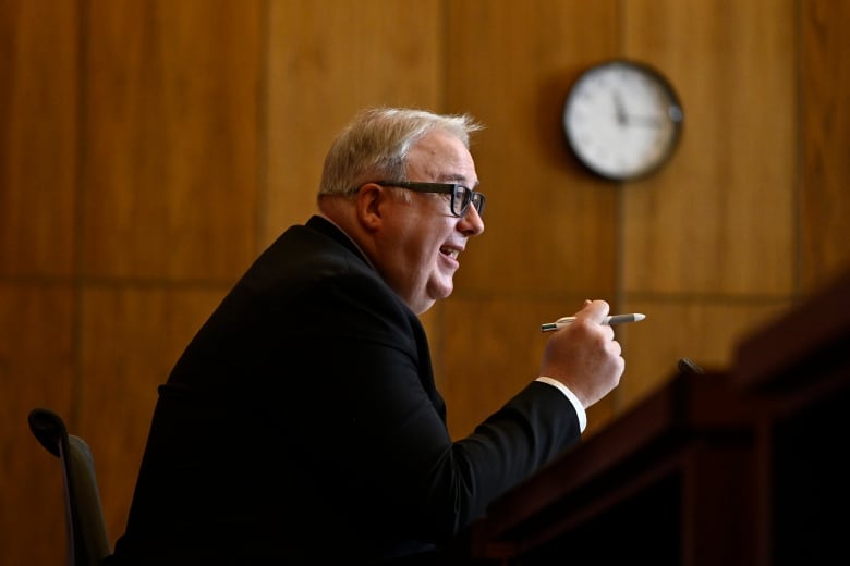 Canadian Taxpayers' Ombudsperson, François Boileau, speaks during a news conference, in Ottawa.