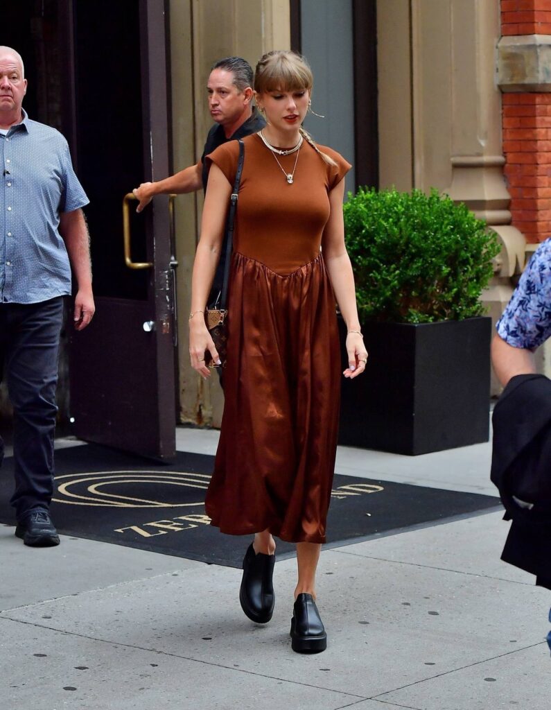 taylor swift pictured in a chic brown dress at zero bond restaurant in new york 6